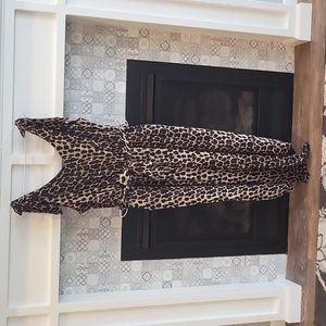 Asymmetrical ankle lenth jump suit with belt and pockets. Size XL leopard print